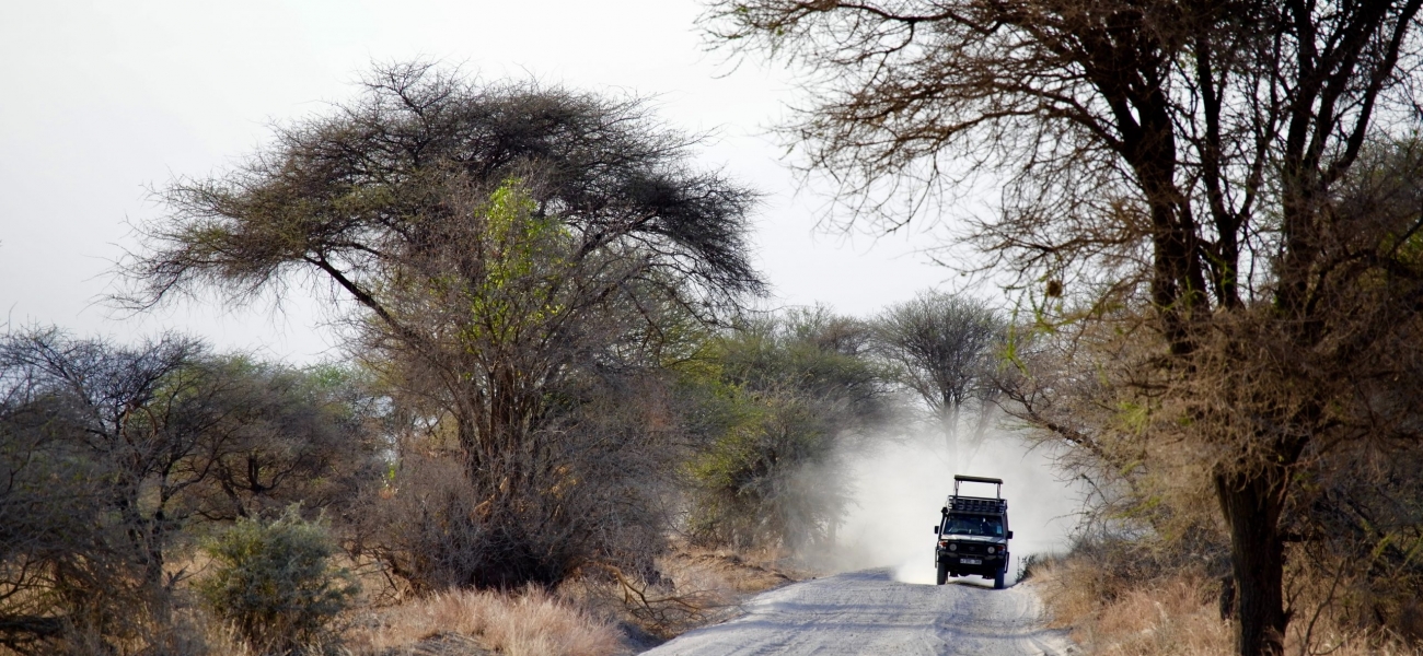 time lapse photography of vehicle on road